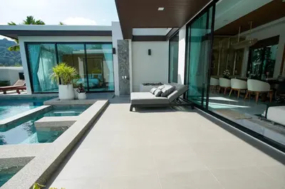a house with a swimming pool and a patio at Andara Ao Nang Pool Villa in Ao Nang Beach
