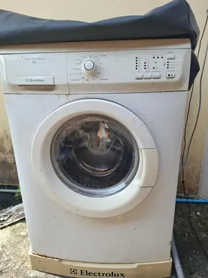 a white washing machine sitting on top at Budget Place Homestay-Solo Traveler in Ban Dan