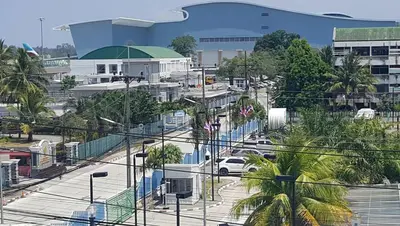 a view of a city with buildings and a street at BS Airport at Phuket in Nai Yang Beach