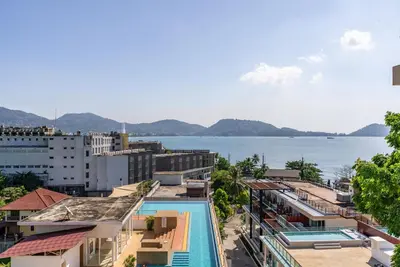 a view of the water from a building at Comfort SeaView Apartment with Private Plunge Pool in Patong Beach