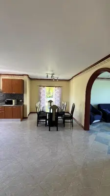 a dining room with a table and chairs at Liina House in Ko Yao Noi