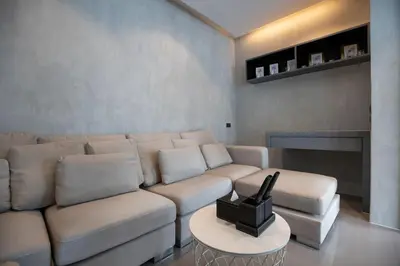 a living room with a couch and a table at 2 BR Pool View in Wellness Residence near Beach P503-4 in Kamala Beach