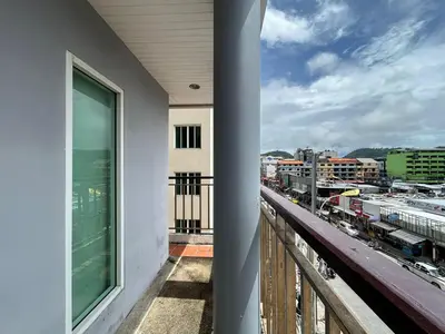 a balcony of a building with a view of a city at Amara APK Resort and Spa in Patong Beach
