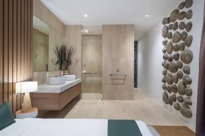 a bedroom with a bathroom with a shower and a sink at Cocoon Villa 6 - Eden Escape 3 BR - Pool - Garden in Ban Sakhu