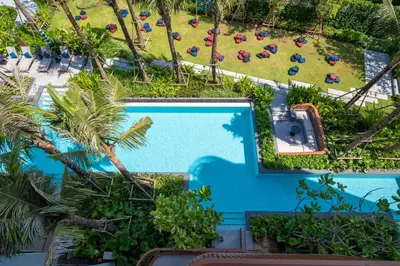 an aerial view of a pool at a resort at Canvas Cherngtalay Holiday Apartments in Laguna Phuket