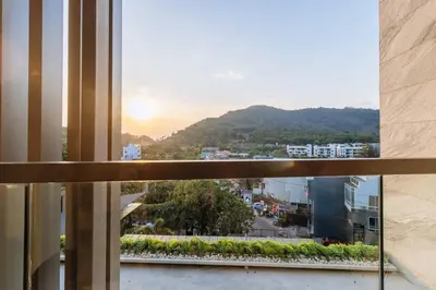 a view from a window of a city at C263 Brand New Condo Near Lake & Nai Harn Beach in Rawai Beach