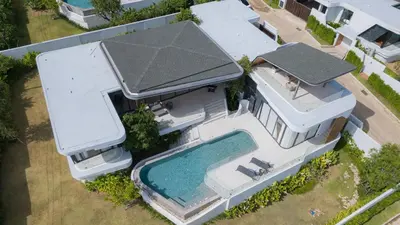an overhead view of a house with a swimming pool at Zavaya Luxury Villa by 87Homes in Layan Beach