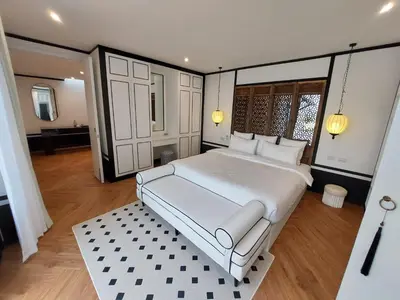 a bedroom with a large white bed in a room at Seaview Swimming pool Villa118-1 in Ban Ao Makham