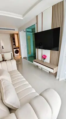 a living room with a white couch and a flat screen tv at Luxury 2 Person Apartment in Heart of Phuket 2 in Ban Ket Ho