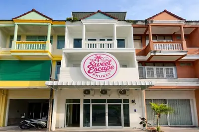 a building with a sign that reads the sweet escape jumps at The Sweet Escape in Ban Kathu