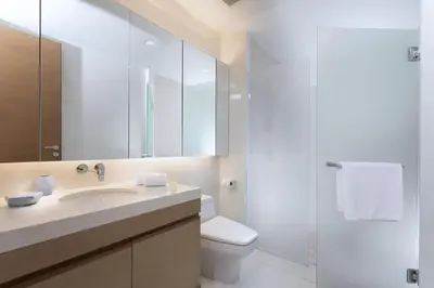 a bathroom with a sink and a toilet and a shower at Apartment 100 м2, Naithon beach in Phuket