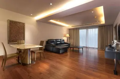 a living room with a couch and a table at Apartment 100 м2, Naithon beach in Phuket