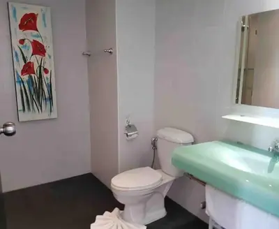 a bathroom with a white toilet and a sink at C257 Studio Seaview Near Beach Pool & Gym View in Patong Beach