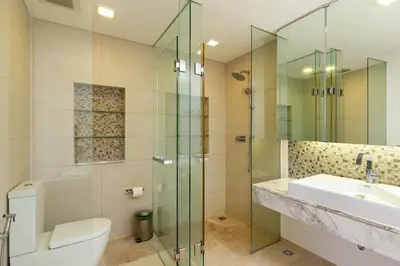 a bathroom with a glass shower and a sink at The Heights C3 SeaView 2 BR, 5min to Kata Beach in Ban Karon