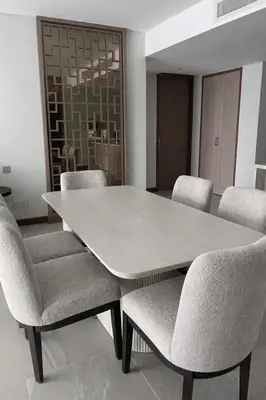 a dining room with a table and chairs at Апартаменты в Angsana, Банг Тао in Laguna Phuket