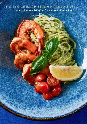 a blue plate with shrimp and pasta and a lemon wedge at Sireha Cafe Resort and Glamping in Ban Khok Chang