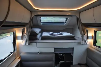 an interior view of the back of an rv with a bed at CoconutRoads Self Drive Motorhome in Phuket