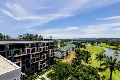 an aerial view of a resort with a river and trees at Premium apartment in Laguna in Thalang