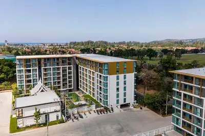 an aerial view of an apartment complex with buildings at The Ozone Bangtao by Beringela in Laguna Phuket