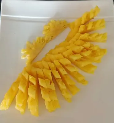 a group of french fries on a white plate at Private single house Kata Beach in Kata Beach