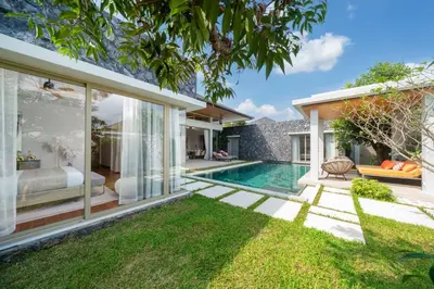 a villa with a pool and a bedroom at NEW Luxury 4BR Villa with Pool & relaxation zones D07 in Phuket