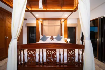 a bedroom with a bed on a balcony at D Villa Phuket-Luxury 6-Bedroom Private Villa in Panwa Entire Place in Phuket Town