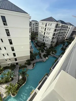 an aerial view of a river between two buildings at Legendary F705 - Top floor family 1BR - The Title Legendary by UNO in Bang Tao Beach