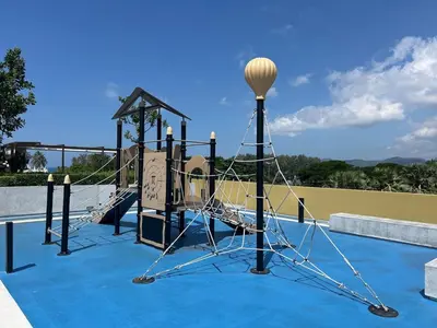a playground with a slide on a blue surface at 3 bedrooms in Laguna, Bangtao Beach 5 min walk in Bang Tao Beach