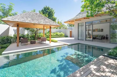 a swimming pool with a gazebo and a house at 3BR Pool Villa at Anchan Flora with a Large Garden in Ban Phru Champa