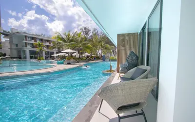 a view of a swimming pool at a resort at Kora 222 3BR Condo with Pool Access in Phuket Town