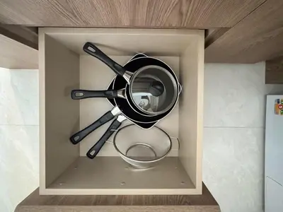 a box with a cooking utensils in it at Lovely 2 Bdr Canvas BangTao in Laguna Phuket