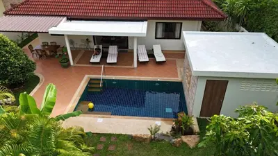 an aerial view of a house with a swimming pool at Lai Thai Villa 4 in Rawai Beach