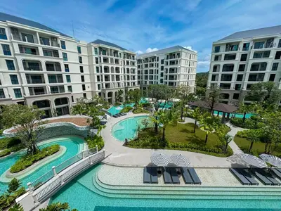 an aerial view of a pool at a resort at Luxury 2 bdr Title Legendary Bang Tao Pool View in Bang Tao Beach