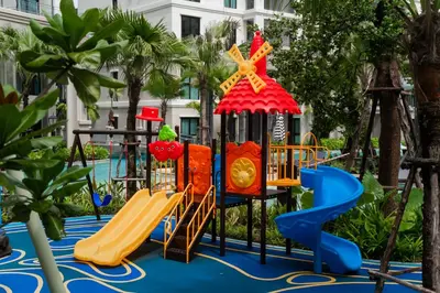 a playground at a resort with a slide at Luxury 2 bdr Title Legendary Bang Tao Pool View in Bang Tao Beach