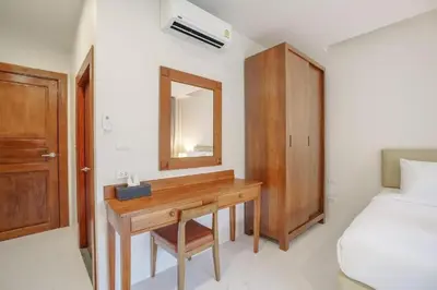 a bedroom with a desk and a bed and a mirror at 1 Bedroom Villa - 2 Minutes to Nai Harn Beach A103 in Rawai Beach