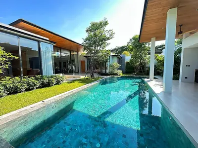 a swimming pool in the backyard of a house at Botanica Foresta Phuket 4 bedroom in Phuket