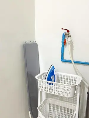 a white laundry basket sitting next to a mirror at Home in Chalong 3 Bedrooms Fully Furnished in Ban Suan
