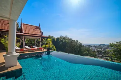 a swimming pool in a villa with a view at Kata Seaview Villa in Ban Karon