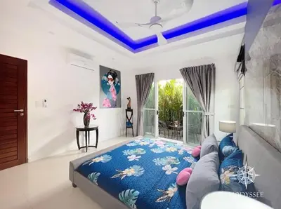 a living room with a bed and a couch at V292 Central Rawai Private Pool Villa with Amenities in Rawai Beach
