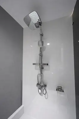 a bathroom with a light hanging from the ceiling at Новые апартаменты в Utopia Naiharn in Rawai Beach