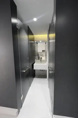 a bathroom with a sink and a toilet and a mirror at Новые апартаменты в Utopia Naiharn in Rawai Beach