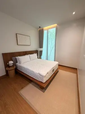 a bedroom with a bed and a window at New 3 Bed Villa Mono Oxygen Bangtao in Ban Thalat Choeng Thale
