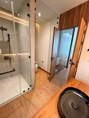 a bathroom with a sink and a glass shower at New 3 Bed Villa Mono Oxygen Bangtao in Ban Thalat Choeng Thale