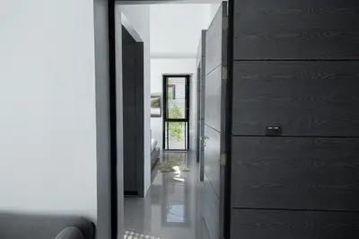 a room with a door leading to a hallway at Villa Wallaya with pool in Bang Tao in Ban Pak Lak
