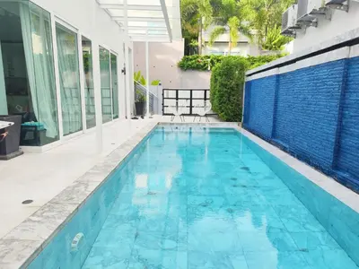 a swimming pool in the middle of a house at 3bedrooms pool Villa Kamala in Kamala Beach