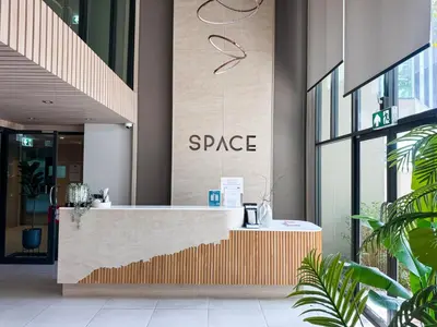 a store front with a counter in a building at Comfortable 2Bdr Bangtao Space Condo in Ban Thalat Choeng Thale