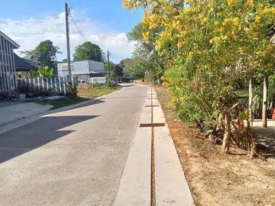 an empty street with a train track in the middle of the road at Kohyaonoi Lastfisherman in Ko Yao Noi