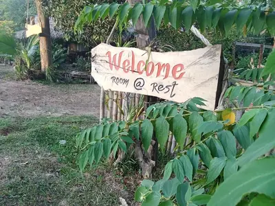 a sign that says welcome from your own rest at Kohyaonoi Lastfisherman in Ko Yao Noi