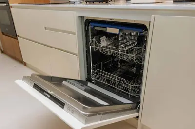 a dishwasher with its door open in a kitchen at V293 Be the First! Brand New Elite Pool Villa in Ban Thalat Choeng Thale