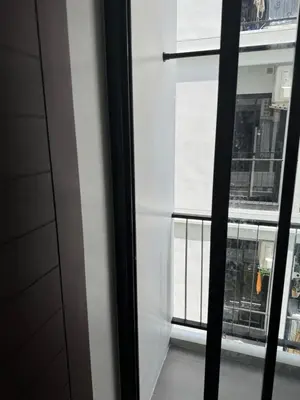 a view of a balcony from a window at VIP Great Hill Airport in Phuket